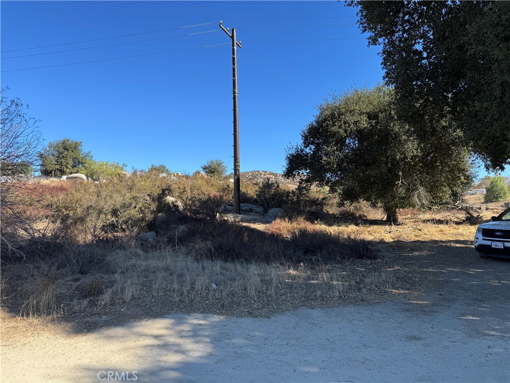 a view of lake with a yard