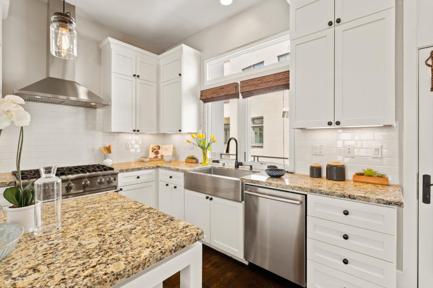 525 Fierro Loop Campbell, CA 95008 - Photo 13 of 48 a kitchen with white cabinets and white appliances