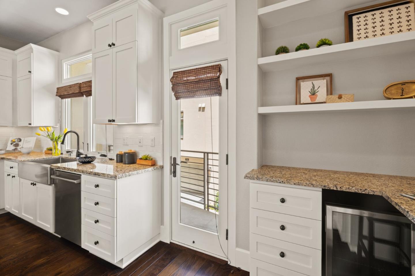 525 Fierro Loop Campbell, CA 95008 - Photo 16 of 48 a kitchen with granite countertop white cabinets and white appliances