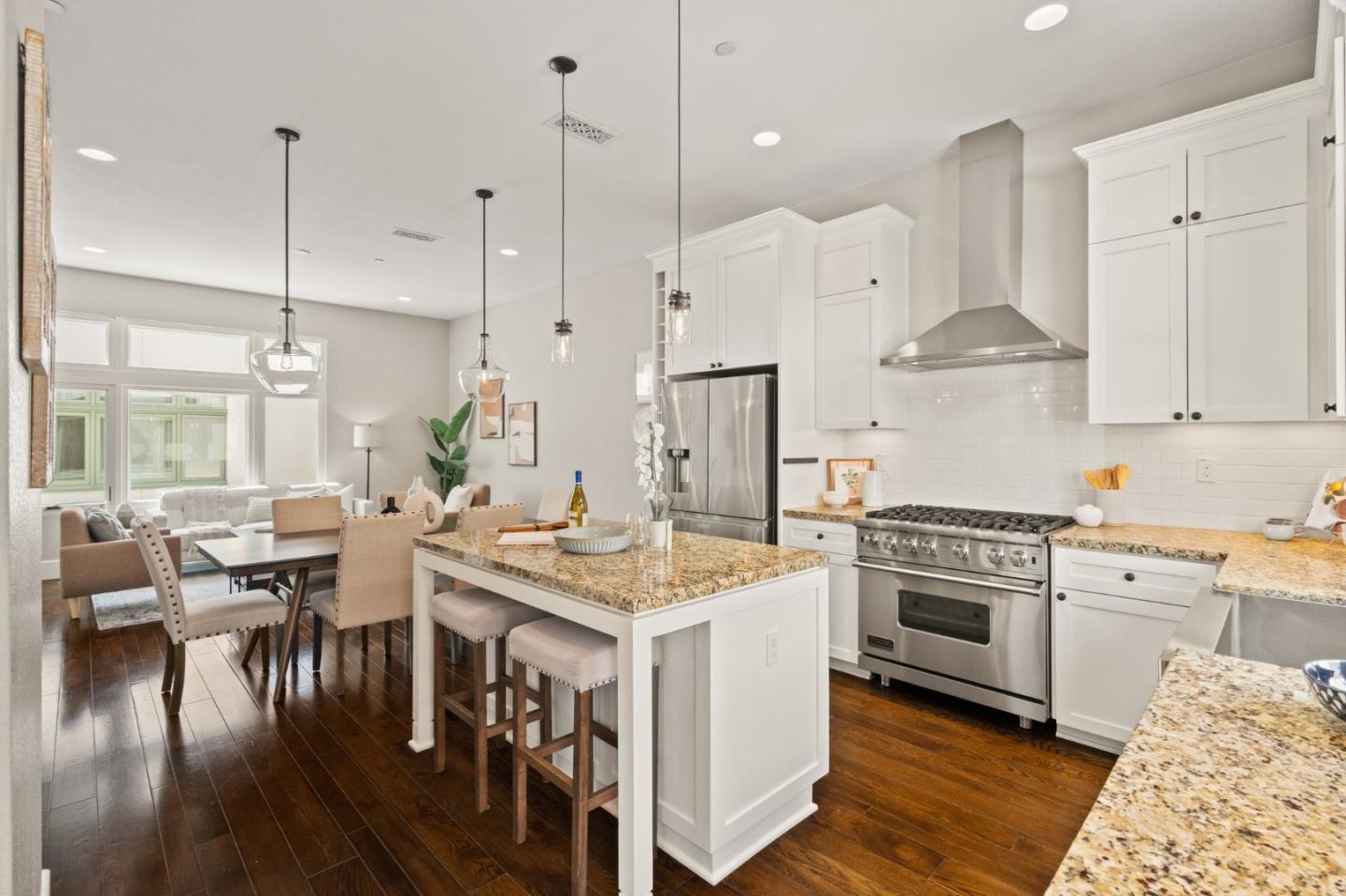 525 Fierro Loop Campbell, CA 95008 - Photo 21 of 48 a open kitchen with stainless steel appliances granite countertop a stove and kitchen island
