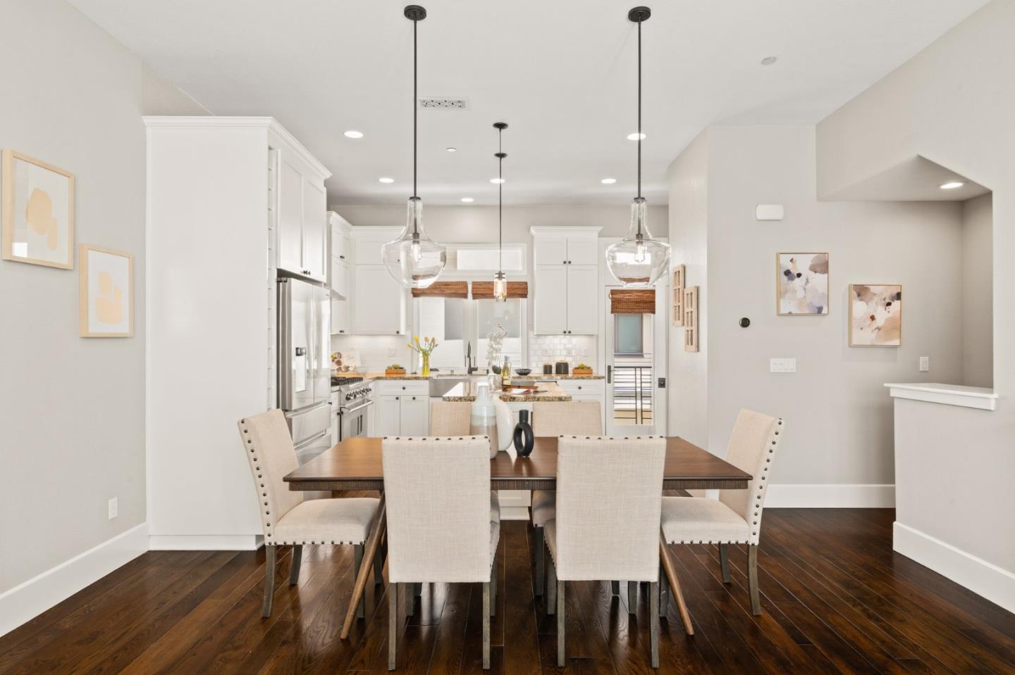 525 Fierro Loop Campbell, CA 95008 - Photo 22 of 48 a view of a dining room and livingroom with furniture wooden floor kitchen chandelier
