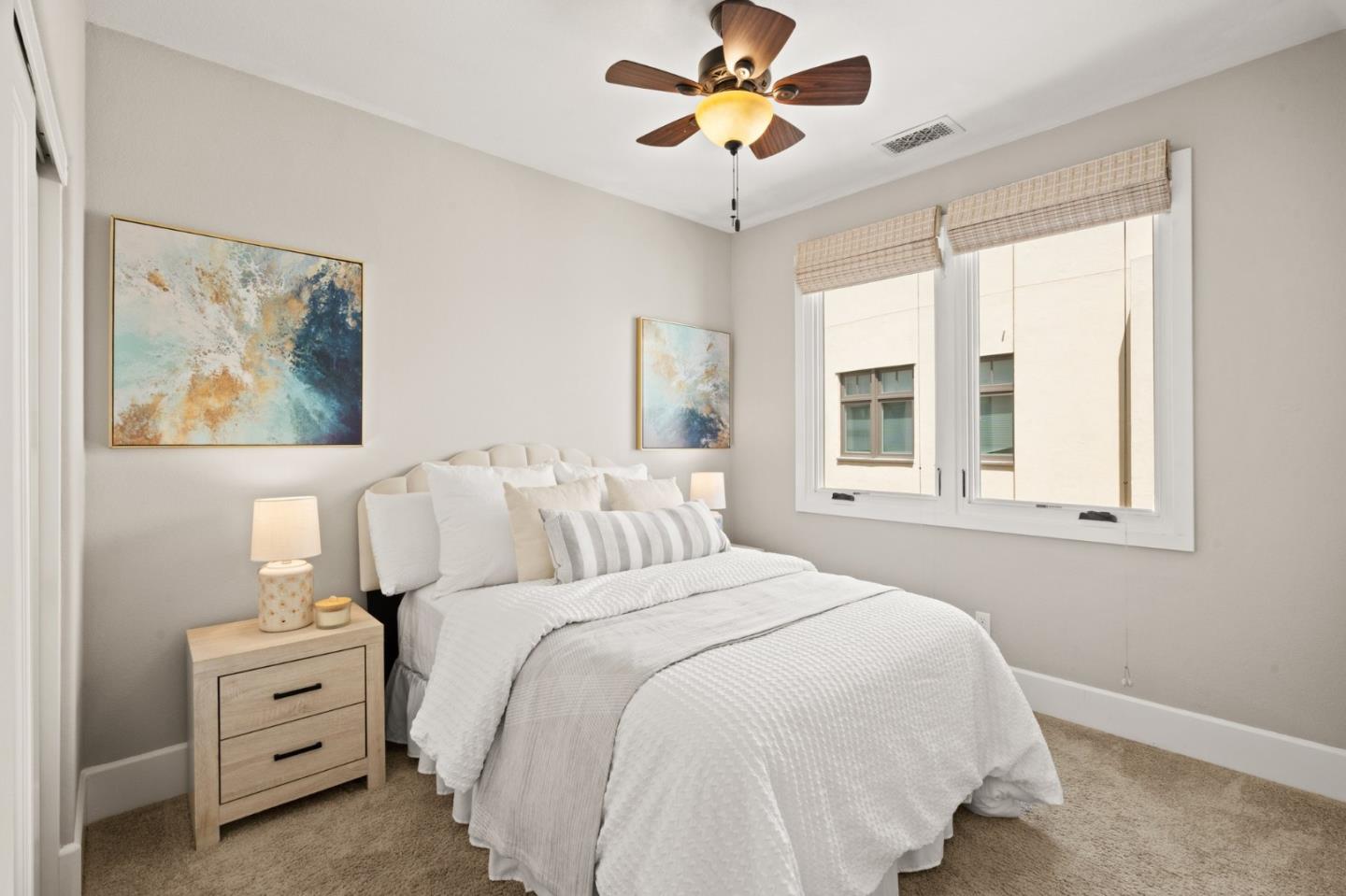 525 Fierro Loop Campbell, CA 95008 - Photo 25 of 48 a bedroom with a bed and a chandelier