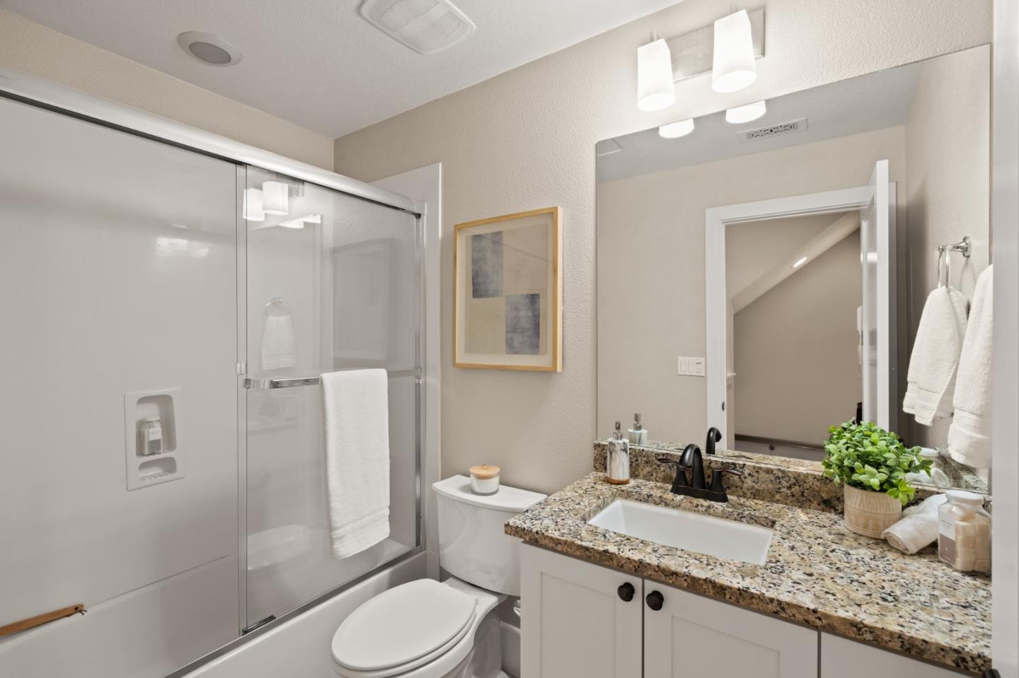 525 Fierro Loop Campbell, CA 95008 - Photo 27 of 48 a bathroom with a granite countertop sink toilet and shower