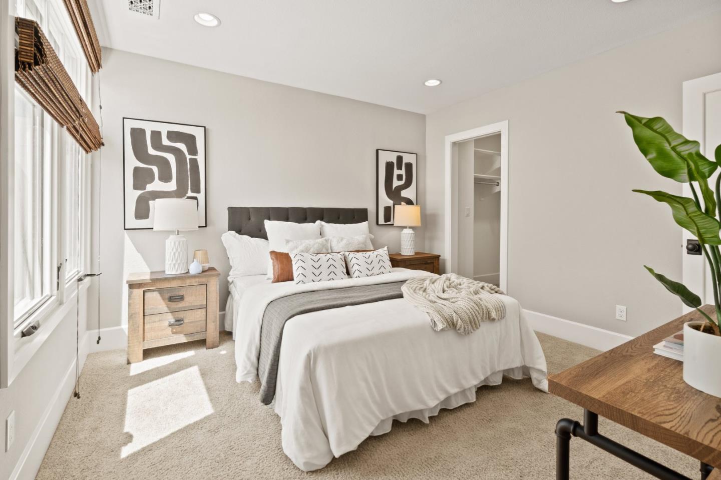 525 Fierro Loop Campbell, CA 95008 - Photo 31 of 48 a bedroom with a bed and paintings on the wall