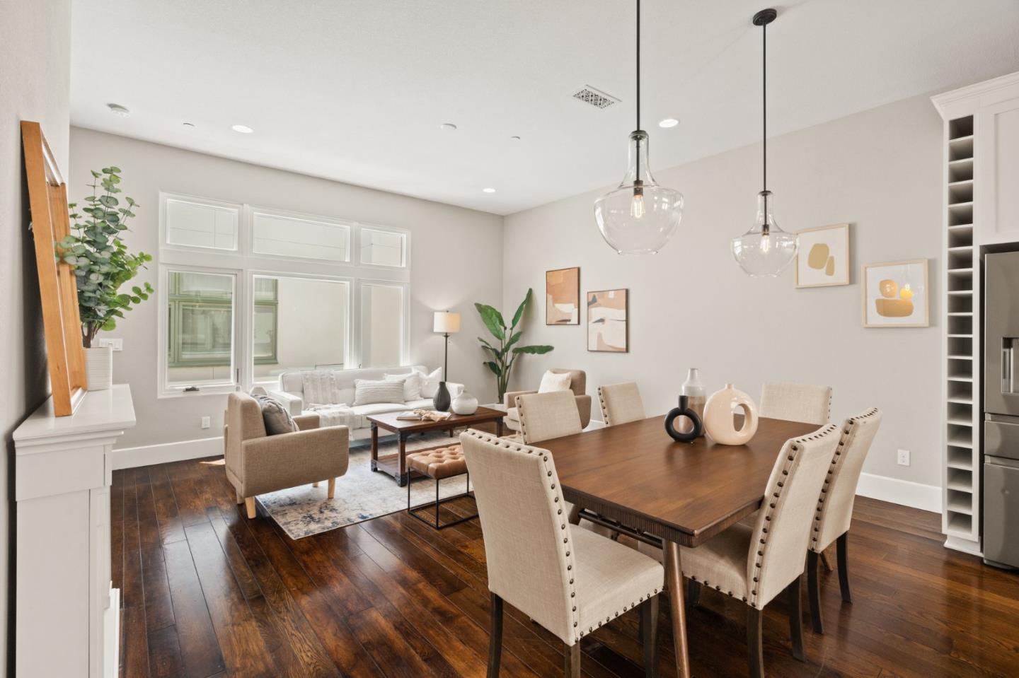 525 Fierro Loop Campbell, CA 95008 - Photo 8 of 48 a view of a dining room and livingroom with furniture wooden floor a chandelier