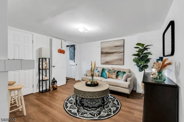 a living room with furniture and a table