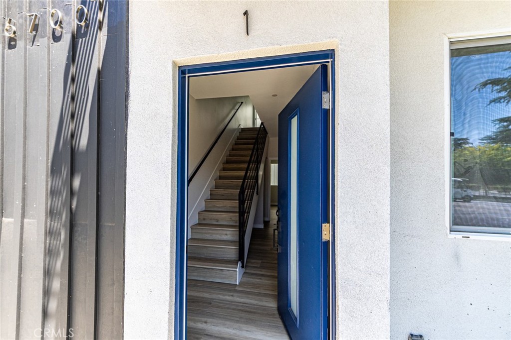 6700 Balboa Boulevard, Unit 1 Van Nuys, CA 91406 - Photo 26 of 54 a view of a hallway with wooden floor and entryway