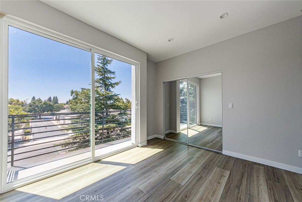 6700 Balboa Boulevard, Unit 1 Van Nuys, CA 91406 - Photo 28 of 54 a view of a room with wooden floor and window