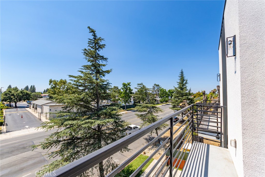 6700 Balboa Boulevard, Unit 1 Van Nuys, CA 91406 - Photo 32 of 54 a view of a balcony with wooden floor and outdoor space