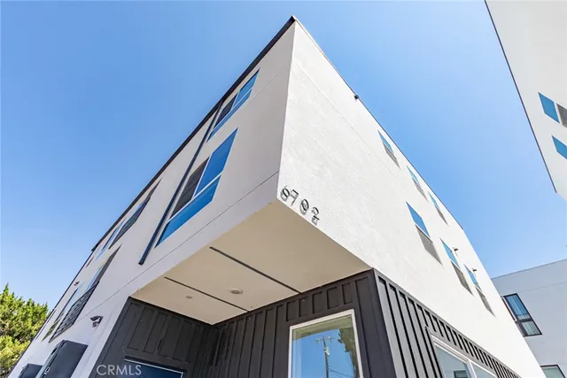 an aerial view of a city with lots of residential buildings