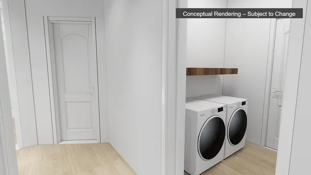 a view of a hallway with washer and dryer