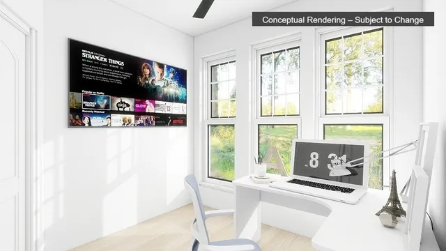 a living room with window and a flat screen tv