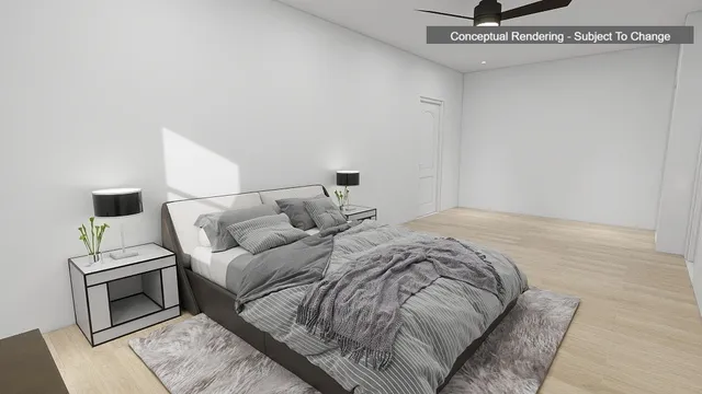 a bedroom with a bed and ceiling fan