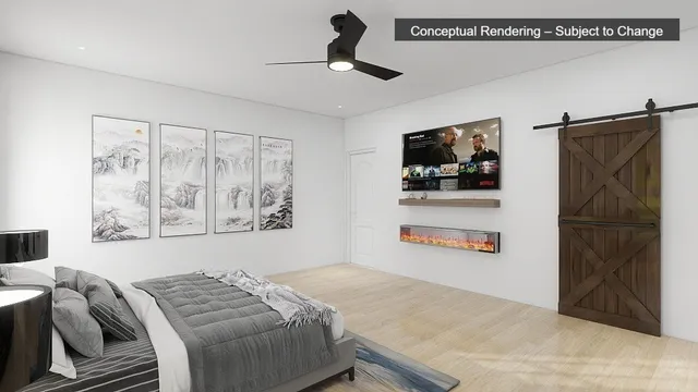 a bedroom with furniture and a flat screen tv