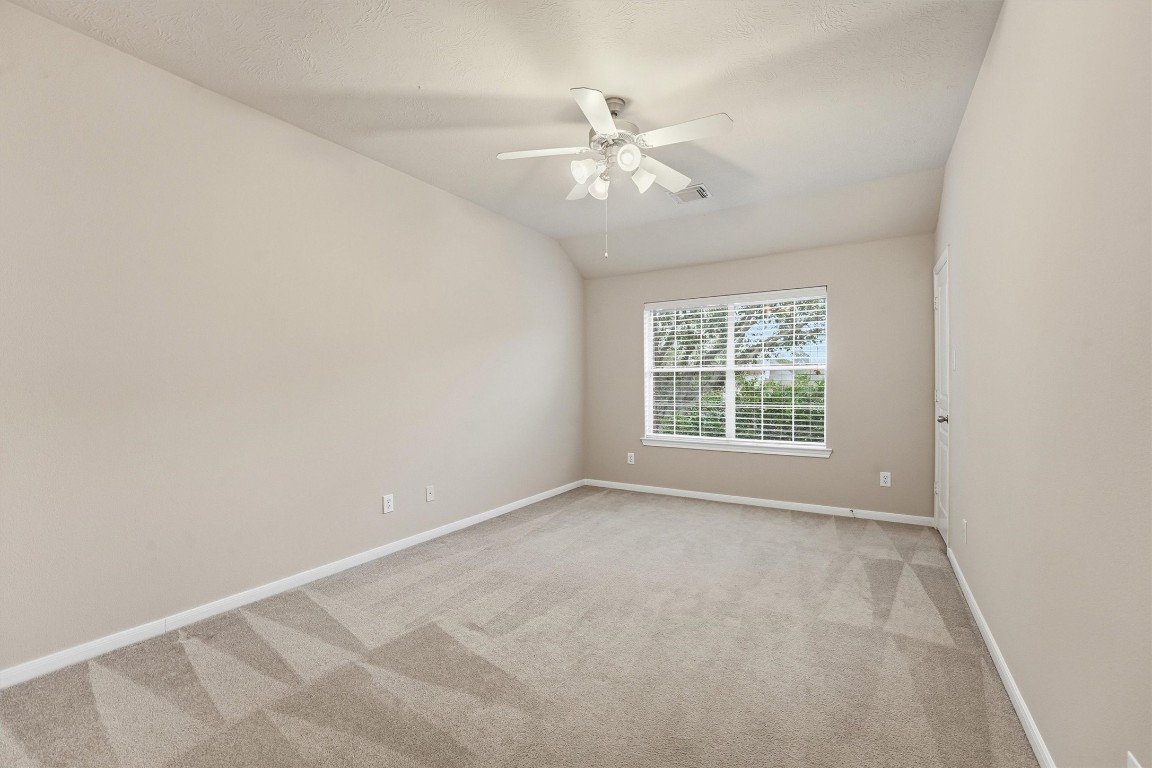 17415 Memorial Mills Drive Spring, TX 77379 - Photo 28 of 37 a view of an empty room with a window