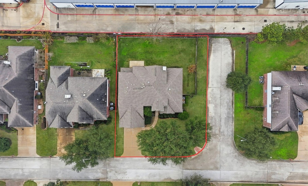 17415 Memorial Mills Drive Spring, TX 77379 - Photo 34 of 37 an aerial view of a house with a yard and lake view