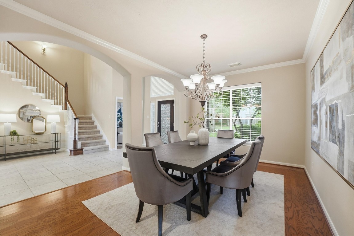 17415 Memorial Mills Drive Spring, TX 77379 - Photo 9 of 37 a view of a dining room with furniture window and wooden floor