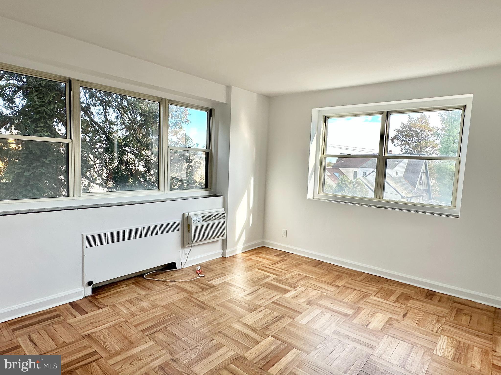 40 Old Lancaster Road, Unit 205 Merion Station, PA 19066 - Photo 13 of 39 Primary corner bedroom with en suite bathroom
