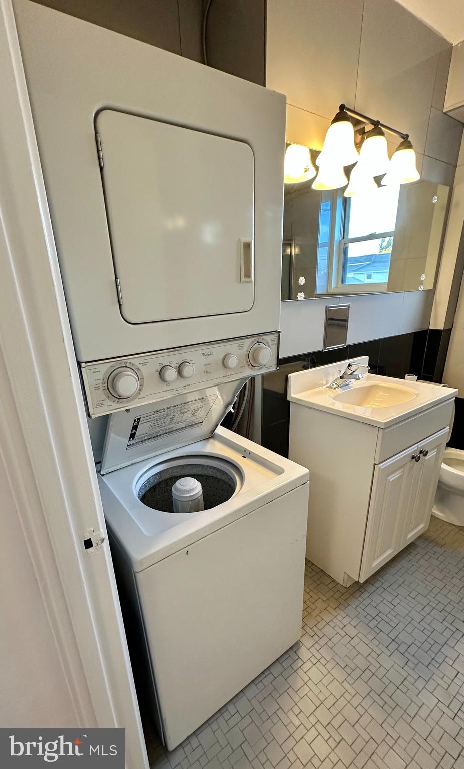 40 Old Lancaster Road, Unit 205 Merion Station, PA 19066 - Photo 22 of 39 Washer/dryer in hall bathroom