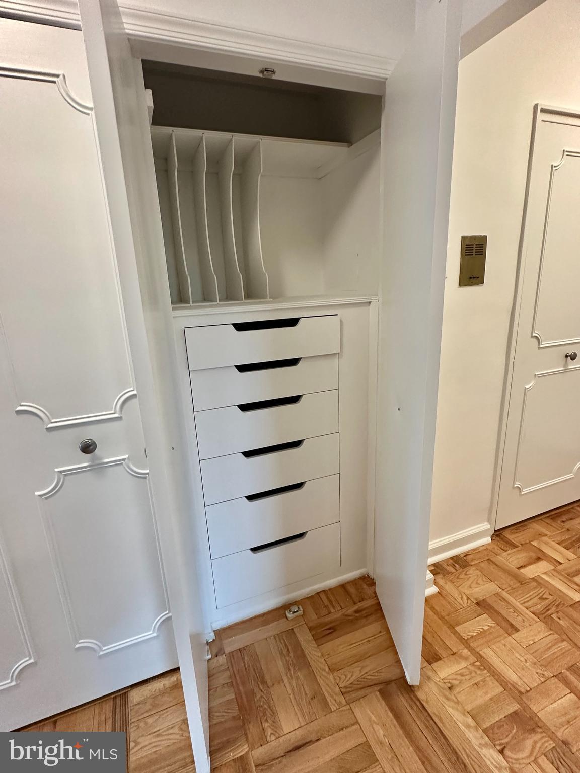 40 Old Lancaster Road, Unit 205 Merion Station, PA 19066 - Photo 8 of 39 Closet in foyer with drawers slots