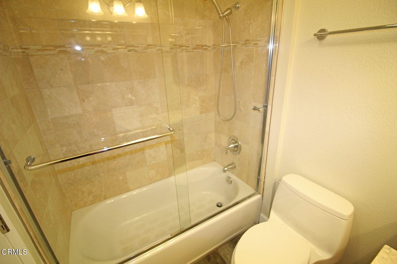 4185 Sunset Lane Oxnard, CA 93035 - Photo 15 of 32 a bathroom with a toilet and a shower