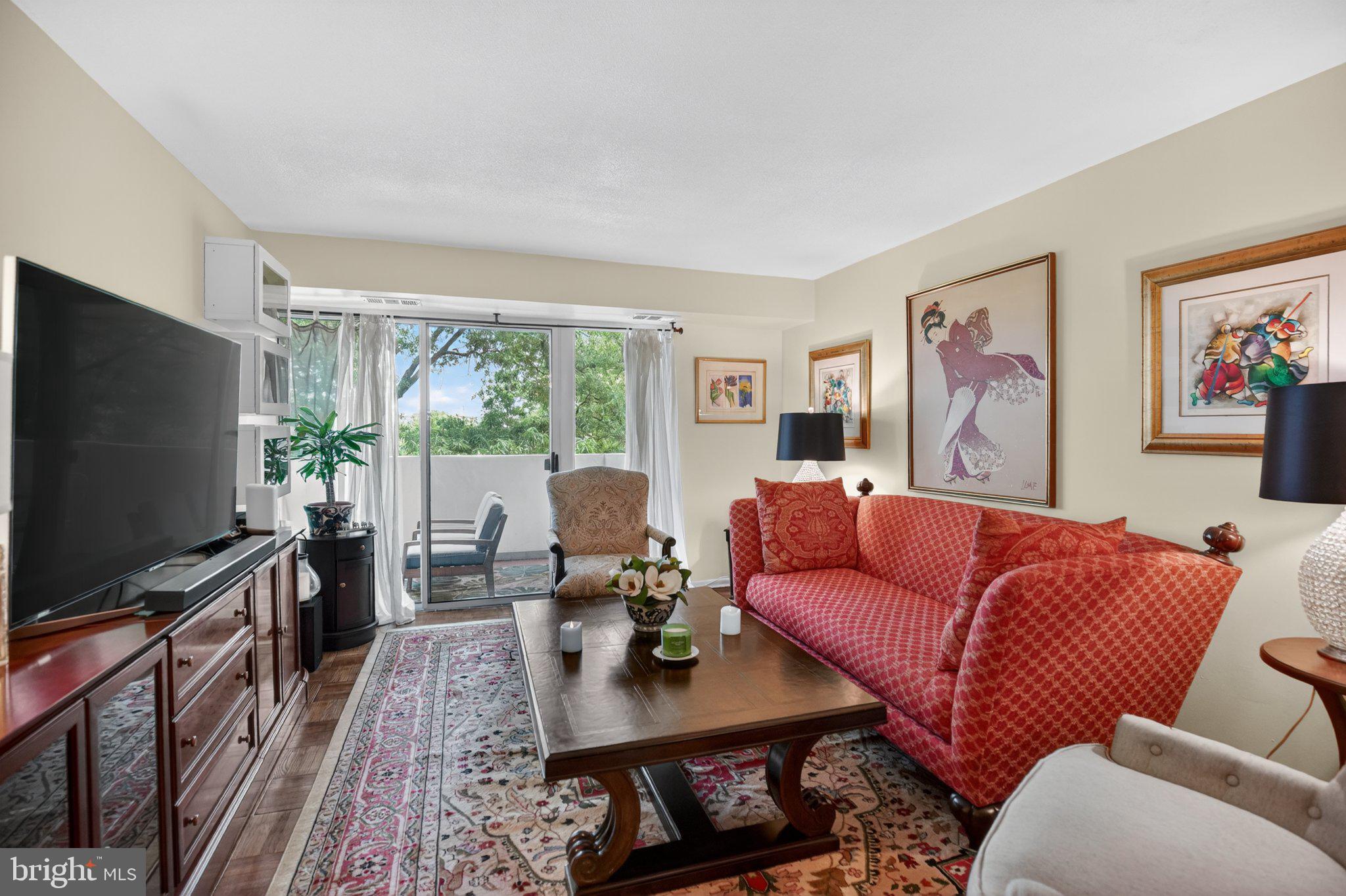 700 7th Street Southwest, Unit 526 Washington, DC 20024 - Photo 7 of 33 Charming living space with vibrant decor.