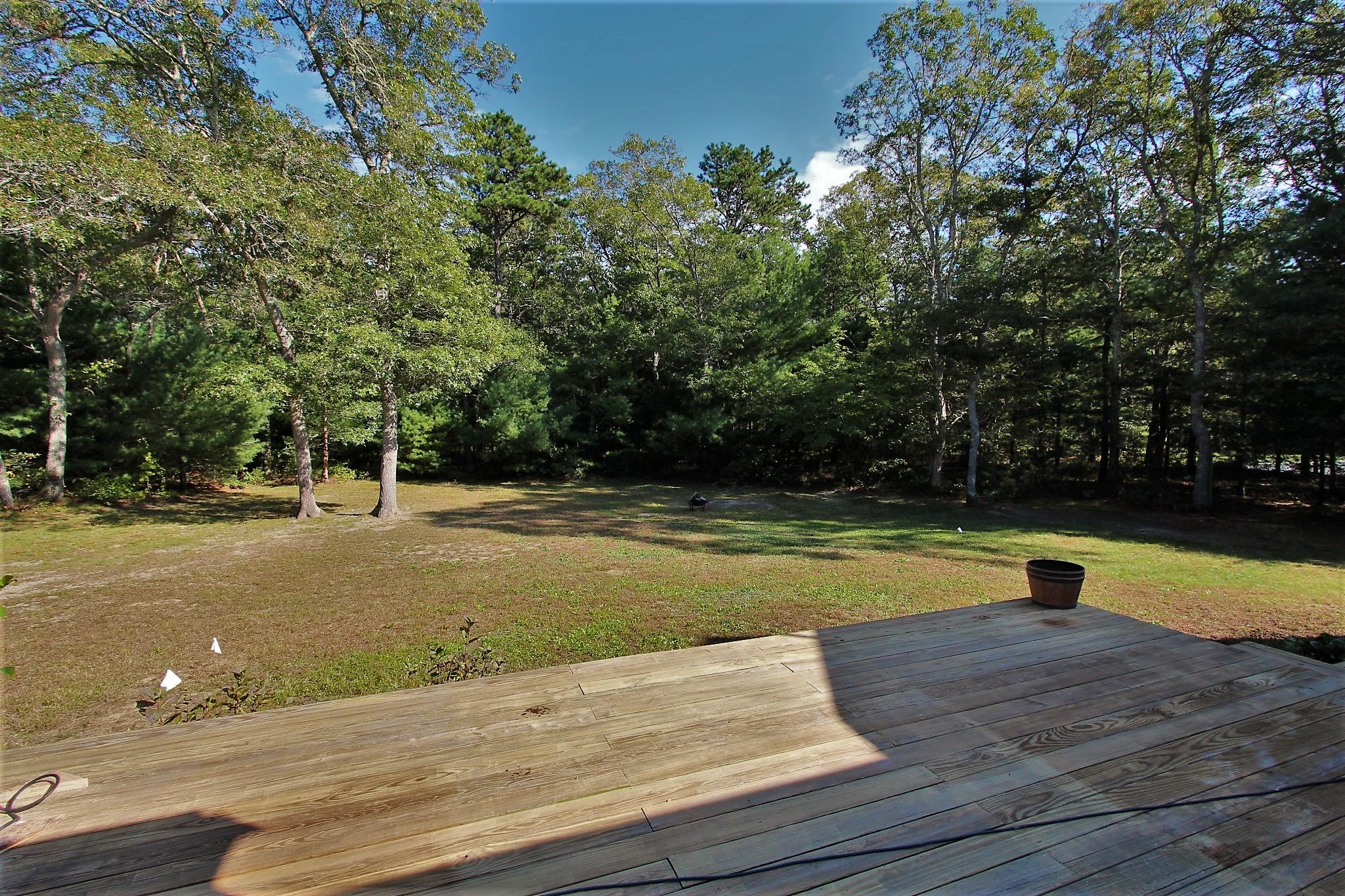 900 Lumbert Mill Road Marstons Mills, MA 02632 - Photo 4 of 28 Backyard