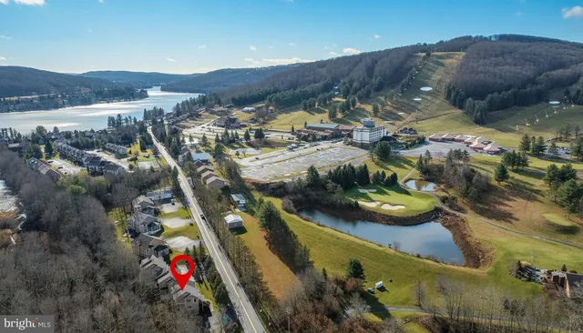 a view of lake and mountain
