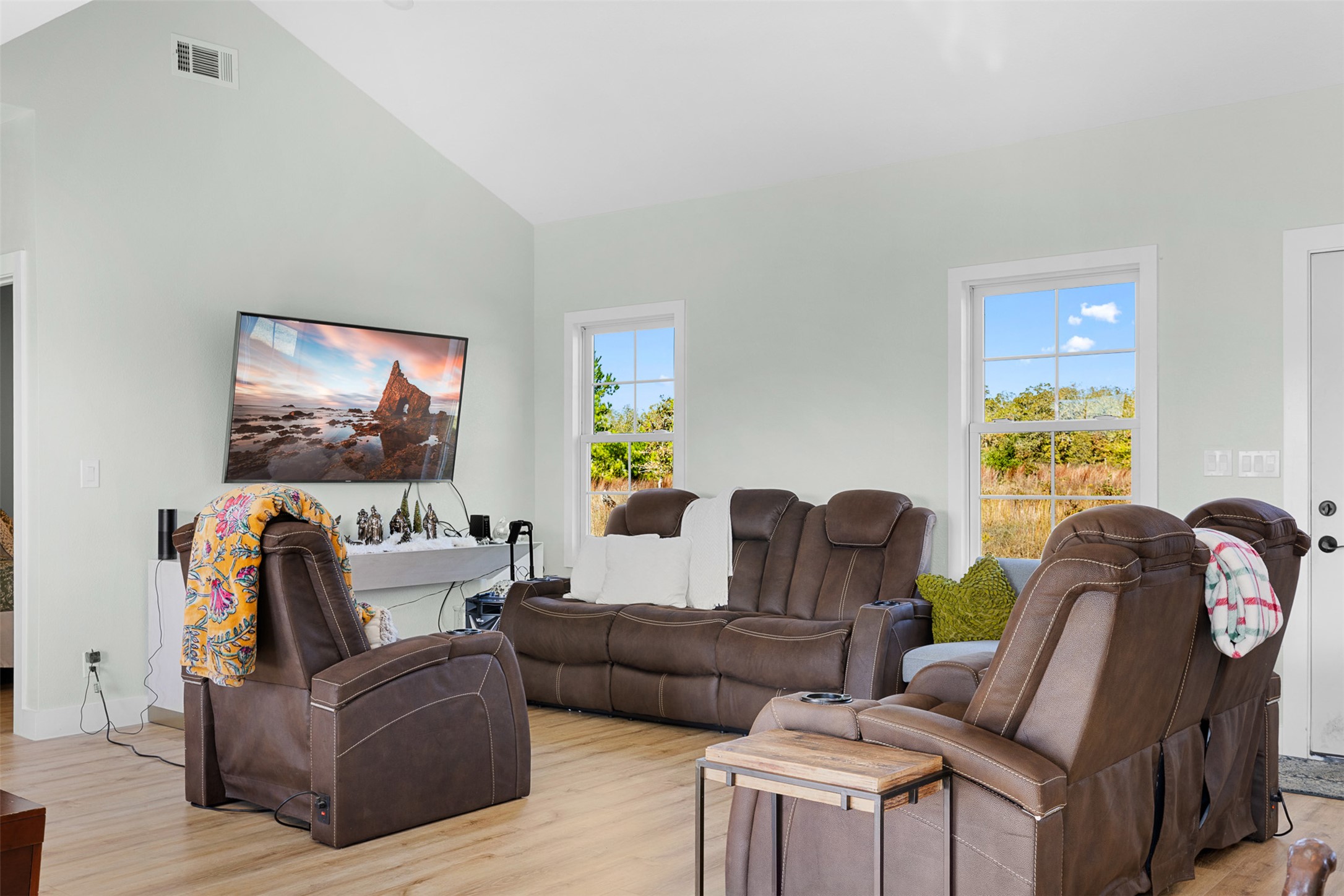 1759 Gotier Trace Road Paige, TX 78659 - Photo 15 of 40 a living room with furniture and a flat screen tv