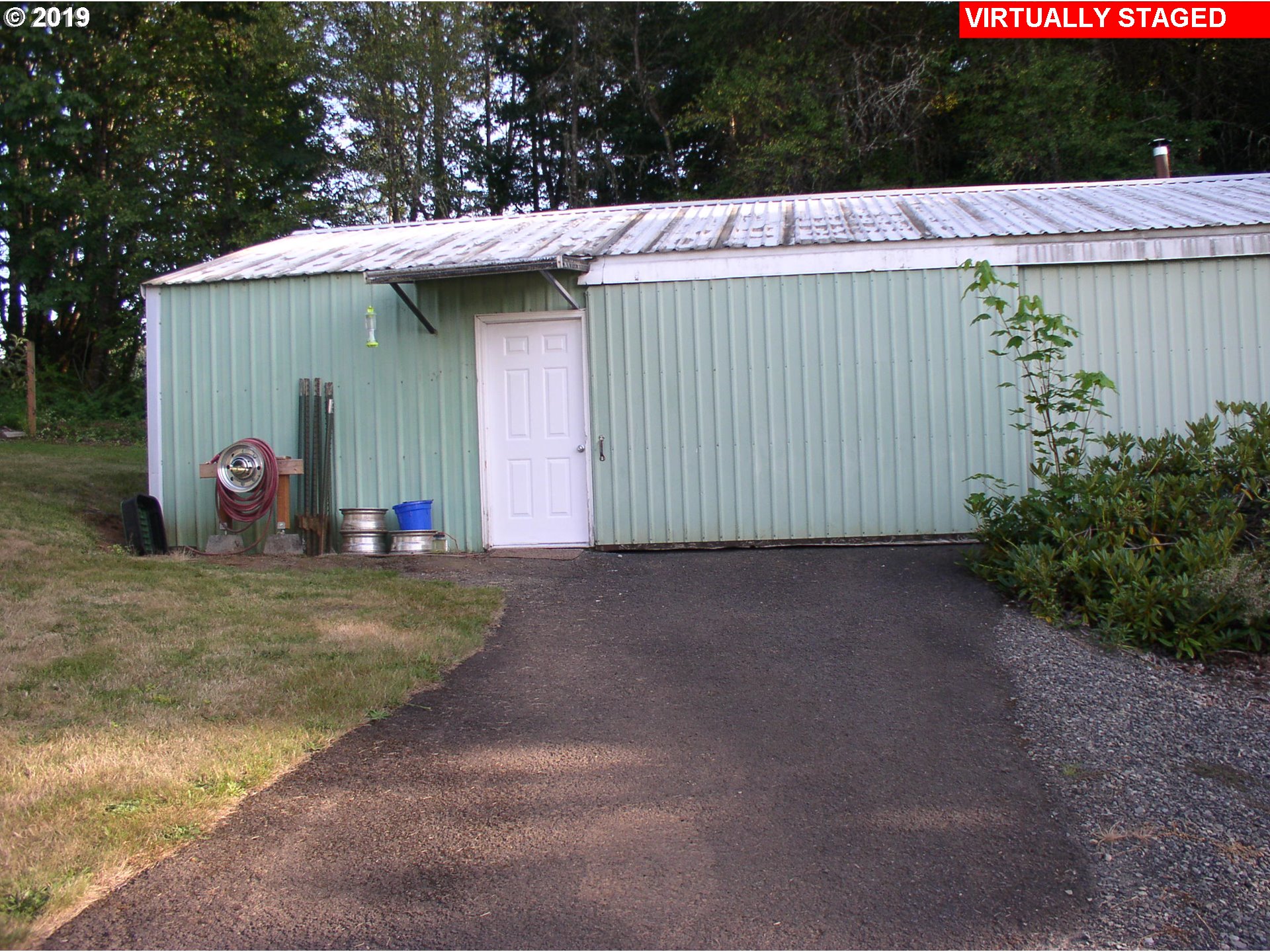 39586 Southeast Trubel Road Sandy, OR 97055 - Photo 14 of 28 a view of a backyard with a barn