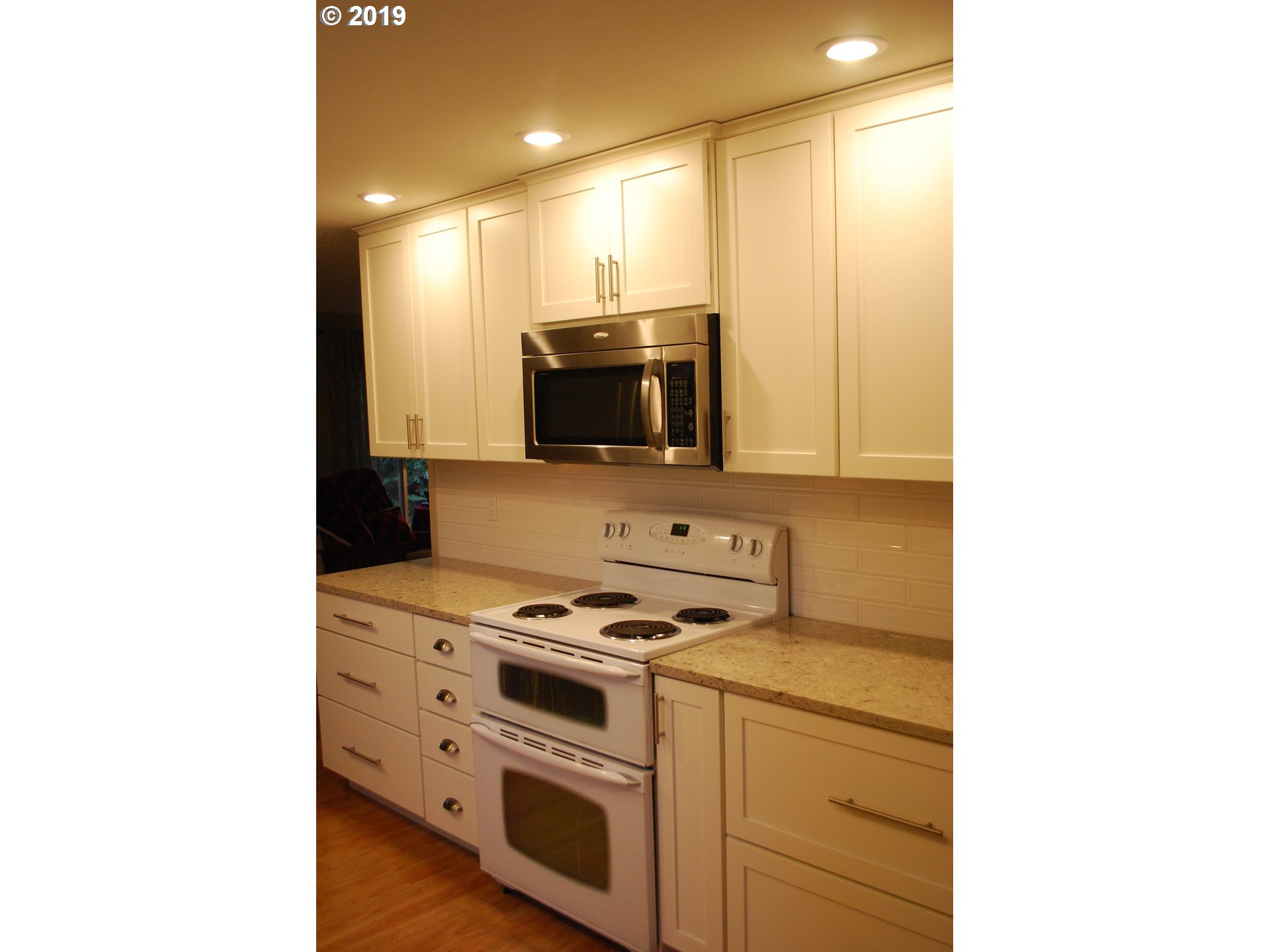39586 Southeast Trubel Road Sandy, OR 97055 - Photo 24 of 28 a view of kitchen with stove and microwave