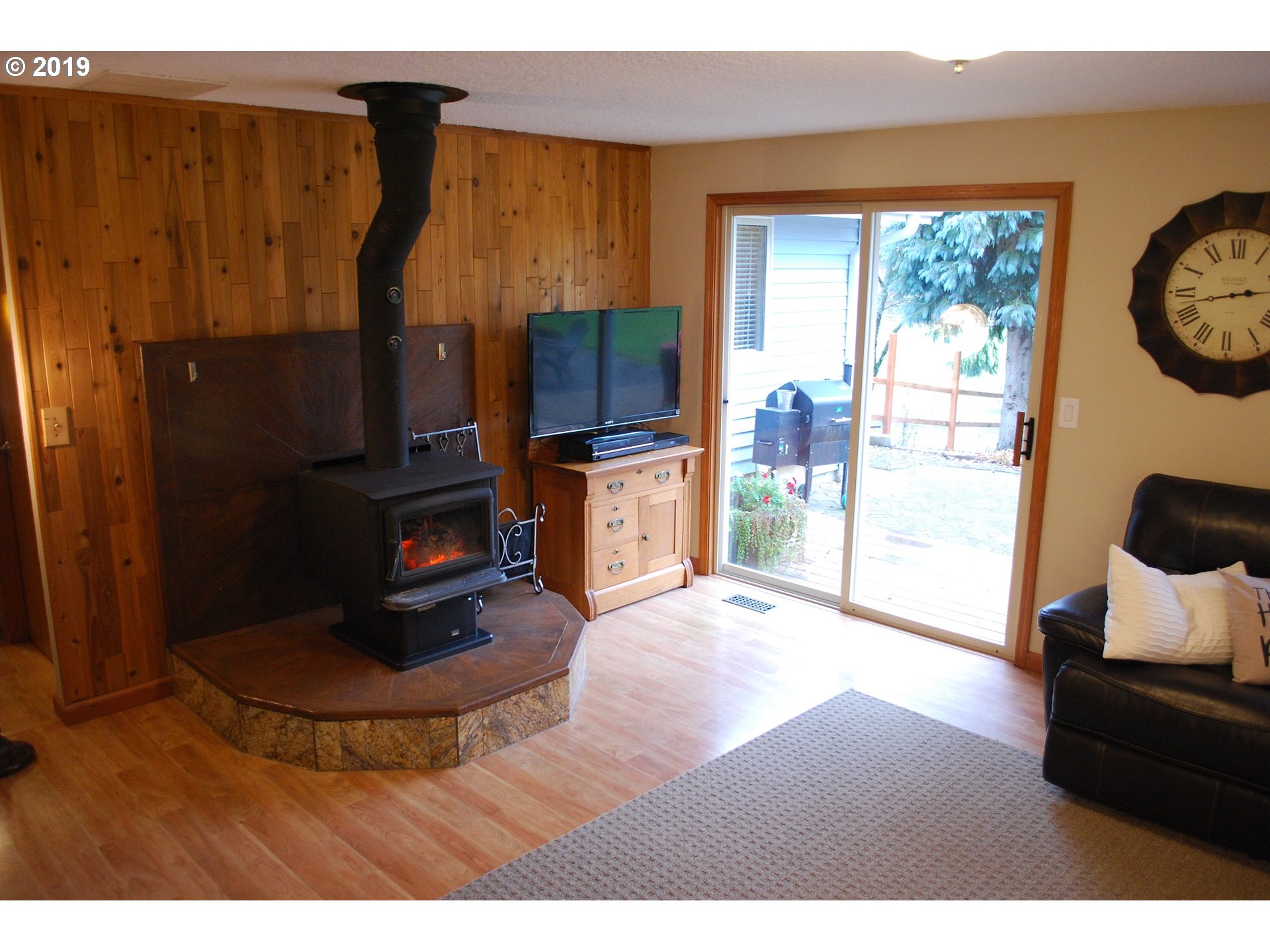 39586 Southeast Trubel Road Sandy, OR 97055 - Photo 7 of 28 a living room with furniture and a fireplace