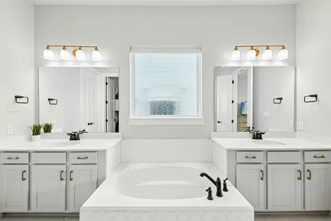 a bathroom with a sink and a bathtub