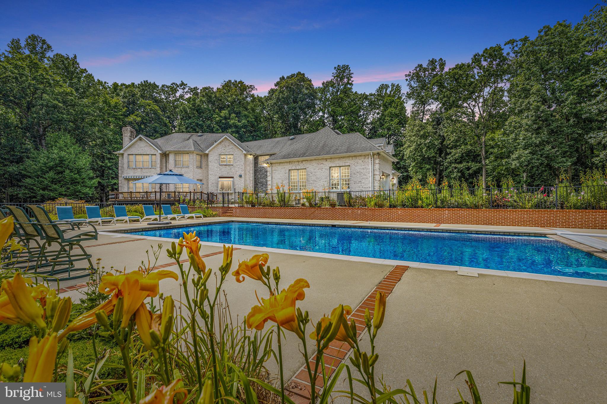 4120 Piney Grove Road Glyndon, MD 21136 - Photo 1 of 42 a view of swimming pool in front of residential houses with outdoor space