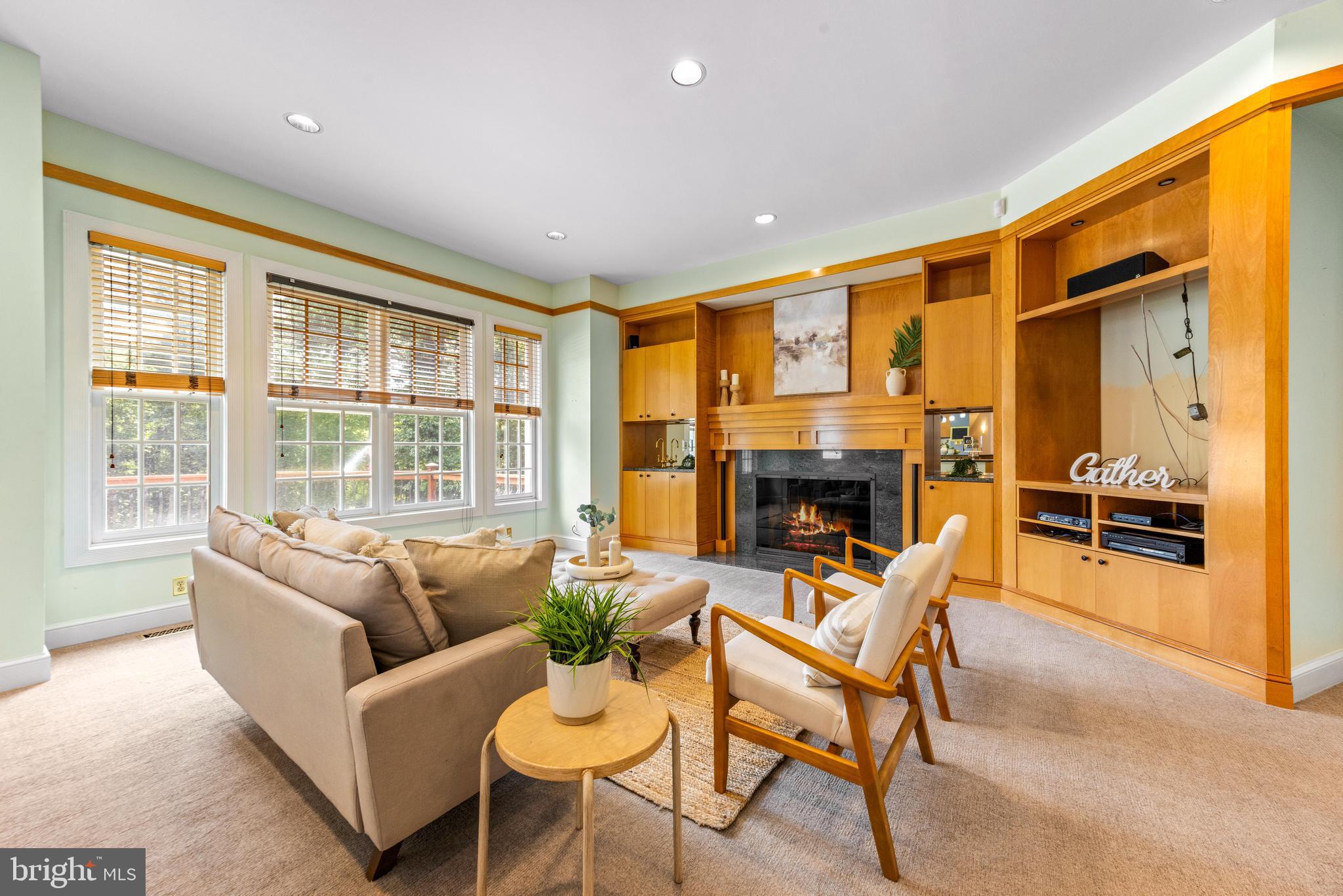 4120 Piney Grove Road Glyndon, MD 21136 - Photo 12 of 42 a living room with furniture and a fireplace