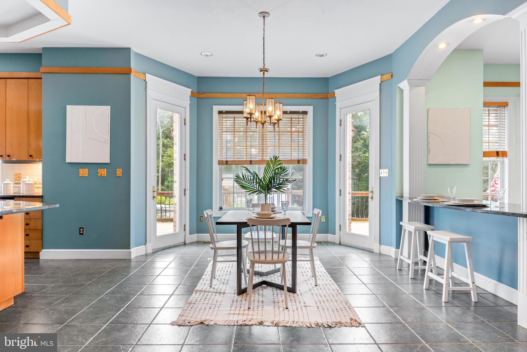 4120 Piney Grove Road Glyndon, MD 21136 - Photo 17 of 42 a dining room with furniture window wooden floor