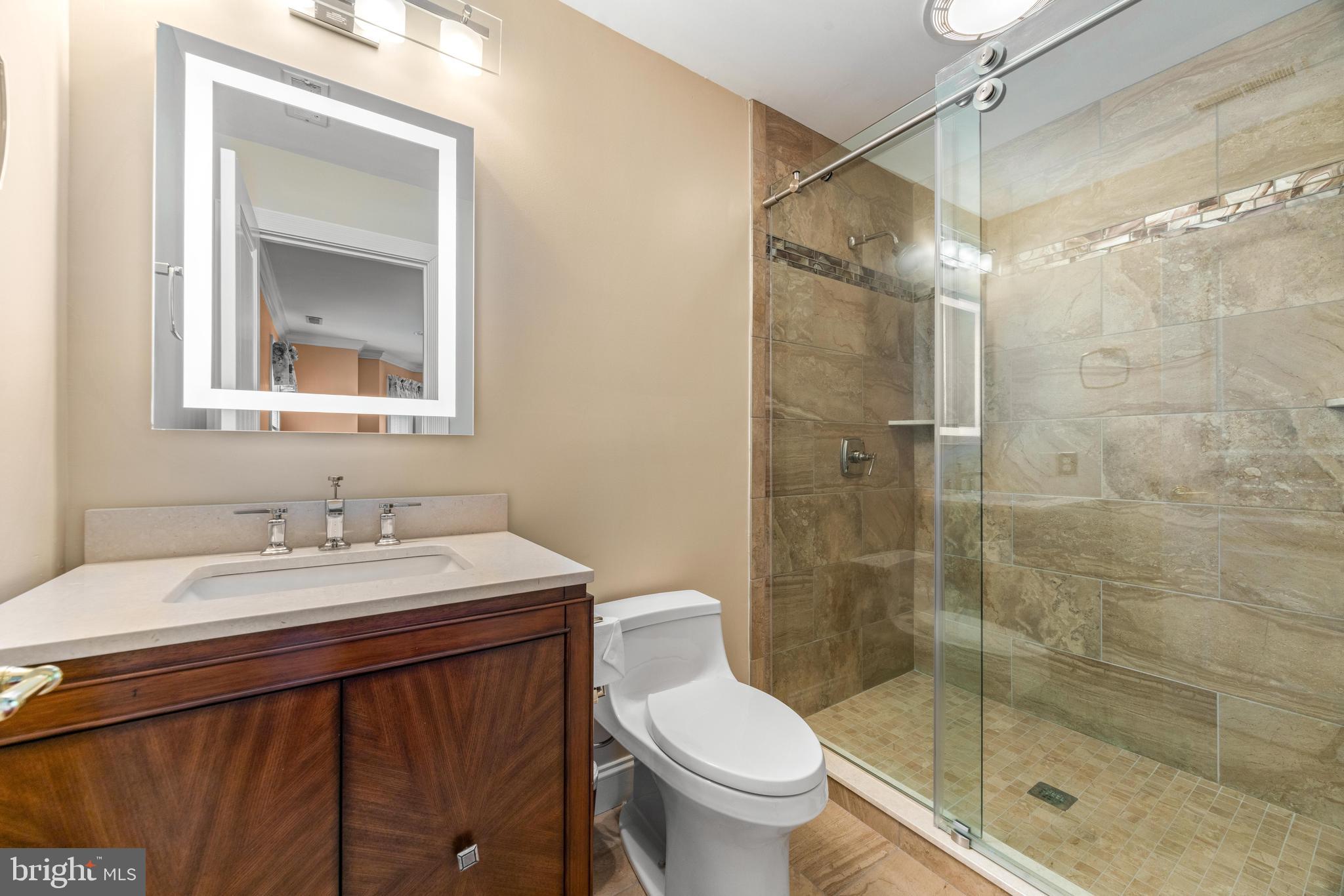 4120 Piney Grove Road Glyndon, MD 21136 - Photo 27 of 42 a bathroom with a sink and a mirror