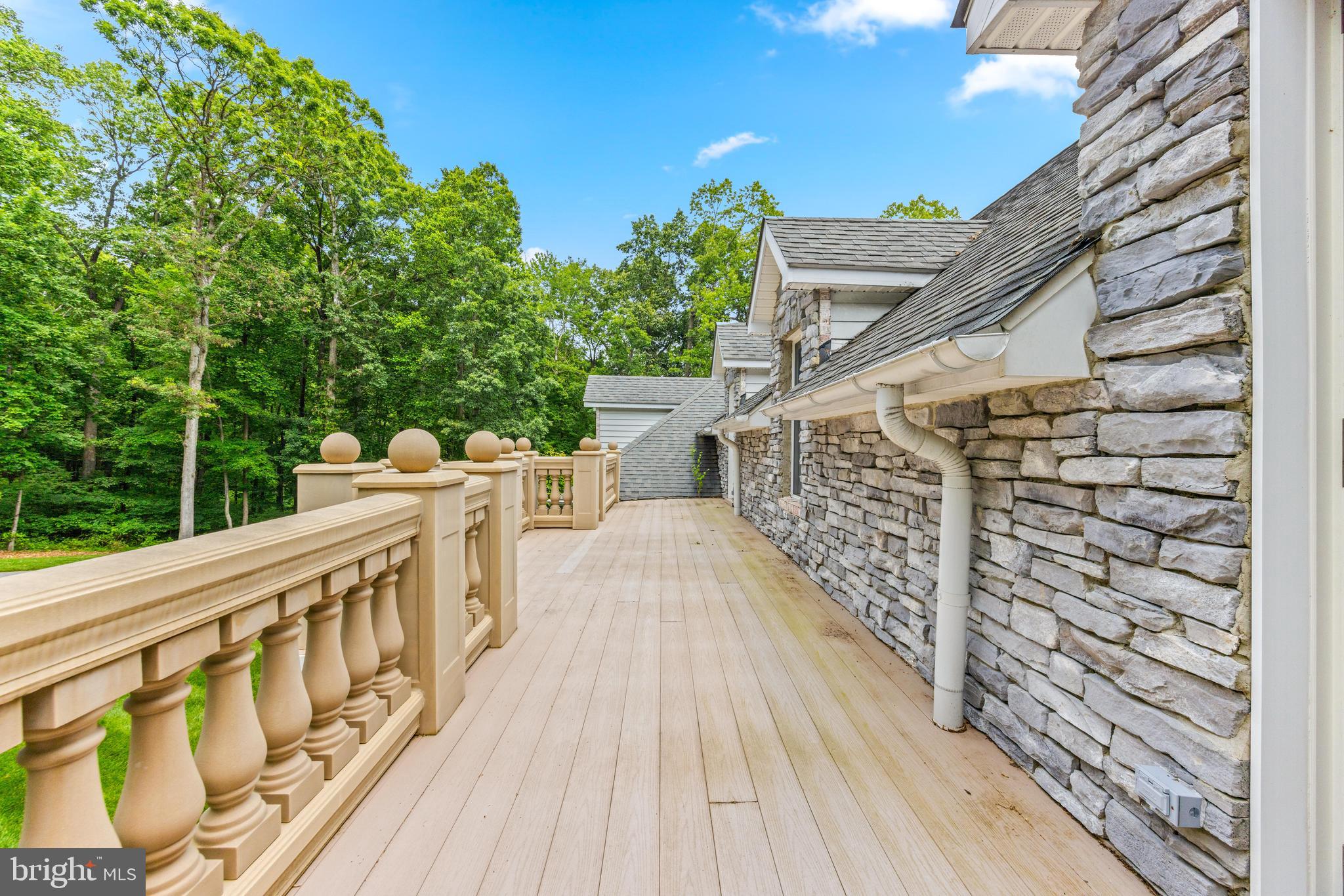4120 Piney Grove Road Glyndon, MD 21136 - Photo 30 of 42 a view of deck with seating space and trees