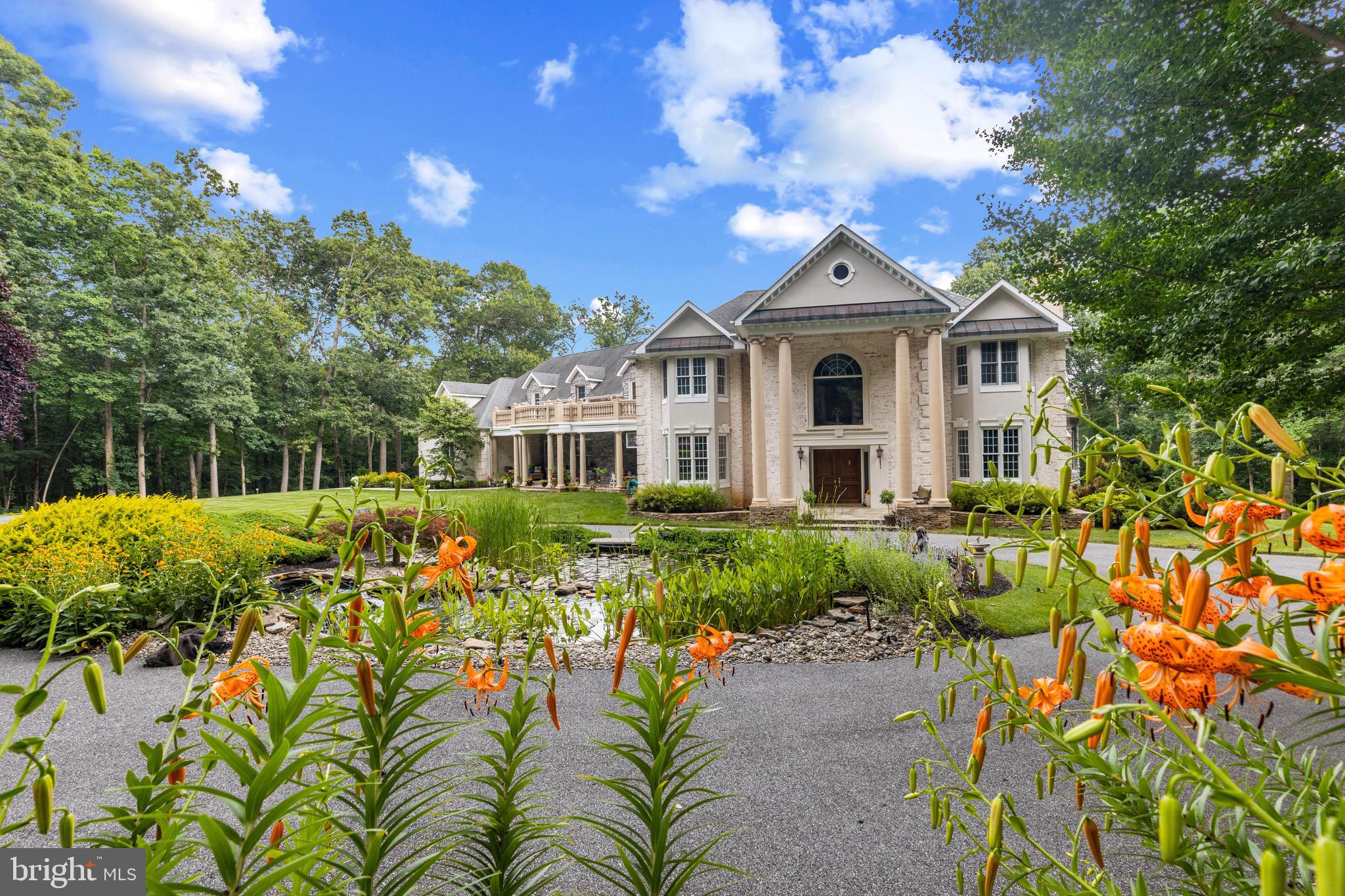 4120 Piney Grove Road Glyndon, MD 21136 - Photo 3 of 42 a front view of a house with a yard