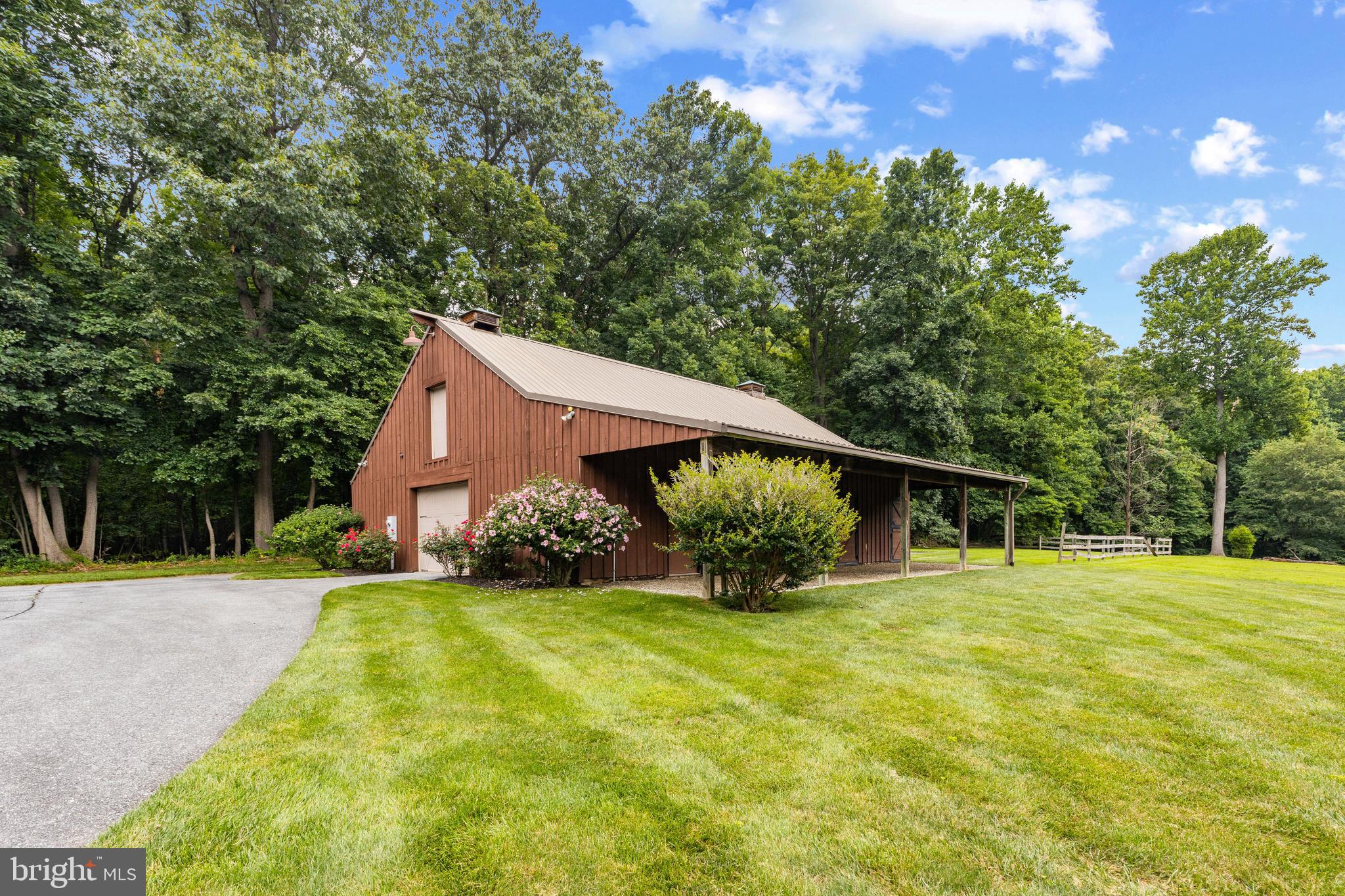 4120 Piney Grove Road Glyndon, MD 21136 - Photo 36 of 42 a view of a house with backyard and garden