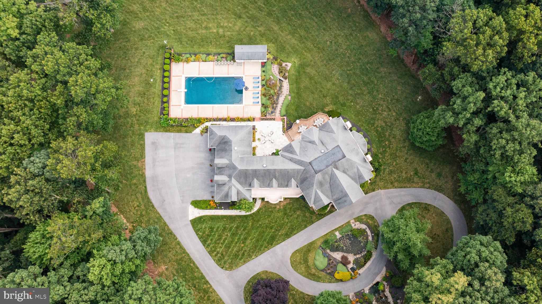 4120 Piney Grove Road Glyndon, MD 21136 - Photo 38 of 42 an aerial view of a house with outdoor space pool seating area and yard