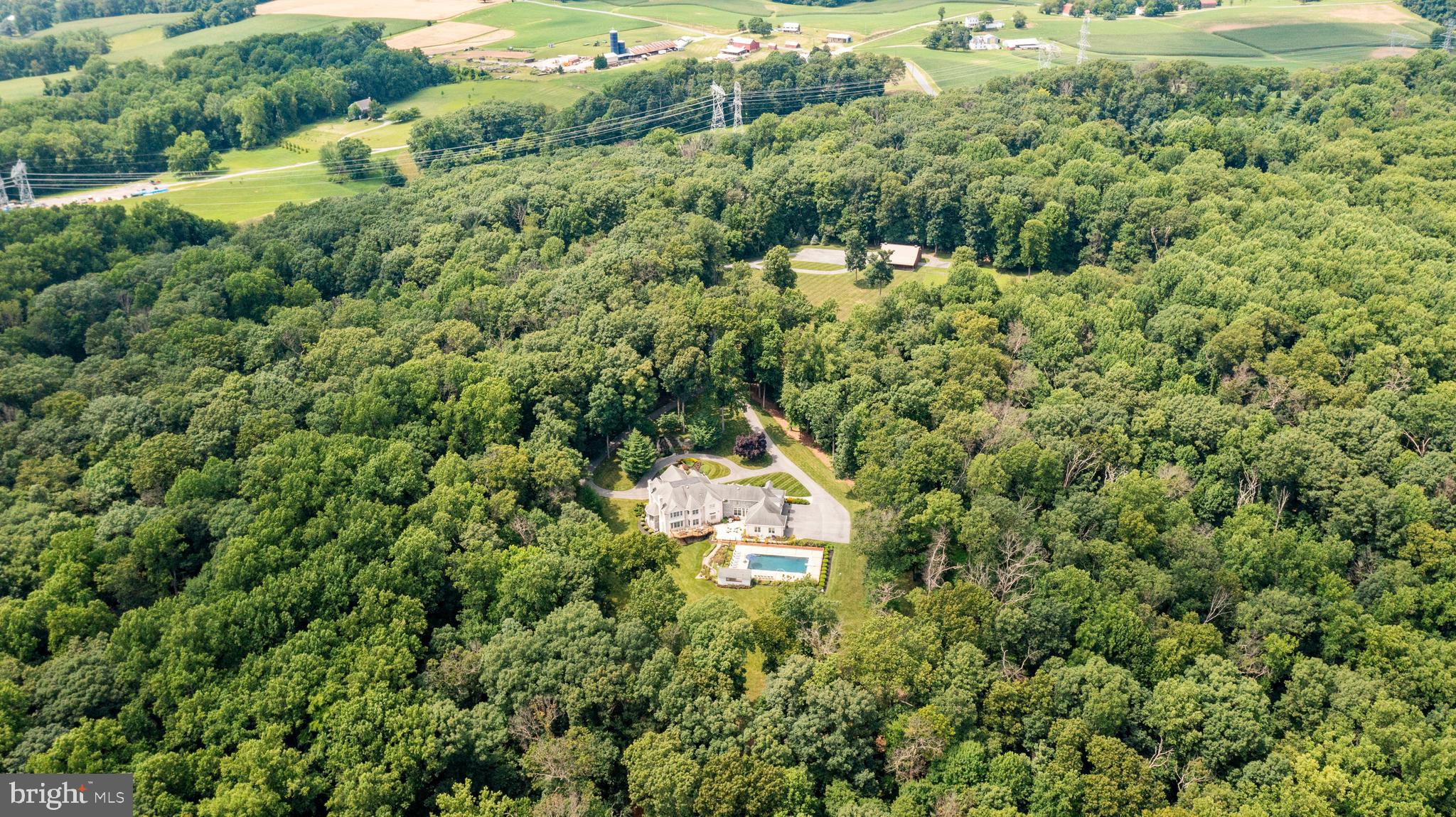4120 Piney Grove Road Glyndon, MD 21136 - Photo 41 of 42 an aerial view of a house with a yard