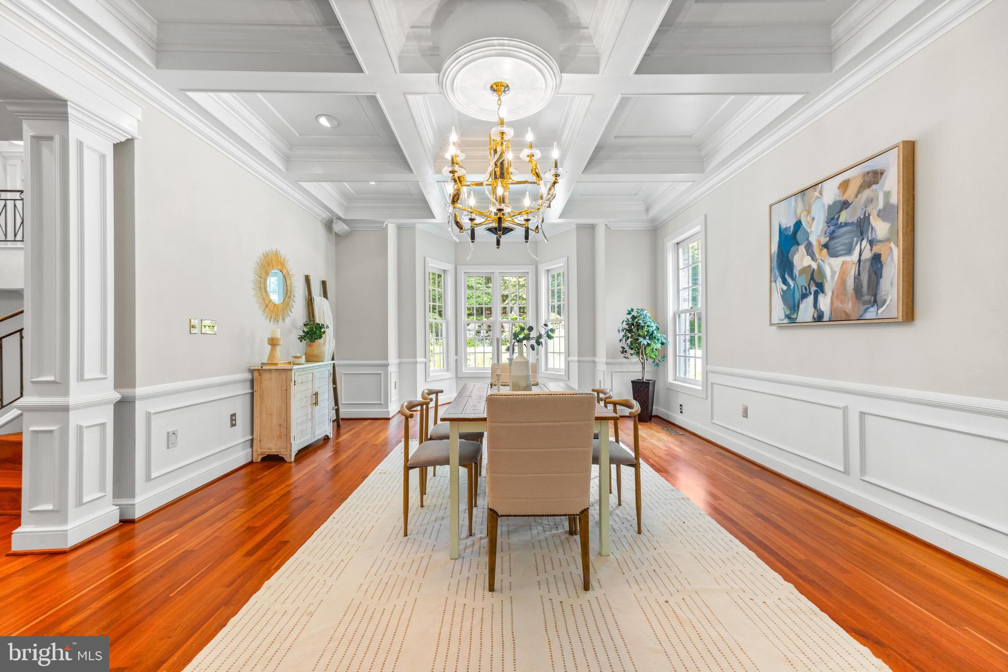 4120 Piney Grove Road Glyndon, MD 21136 - Photo 9 of 42 a view of a dining room with furniture a chandelier and wooden floor