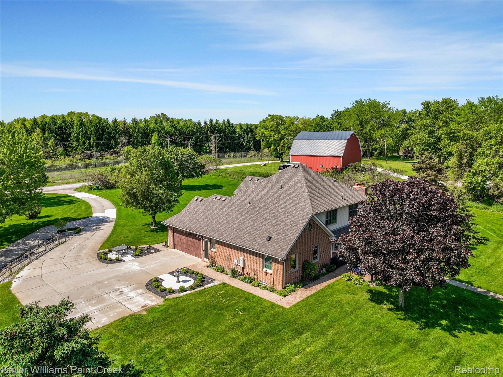 5813 36 Mile Road Romeo, MI 48065 - Photo 64 of 81 Brick exterior with a multi-level roofline