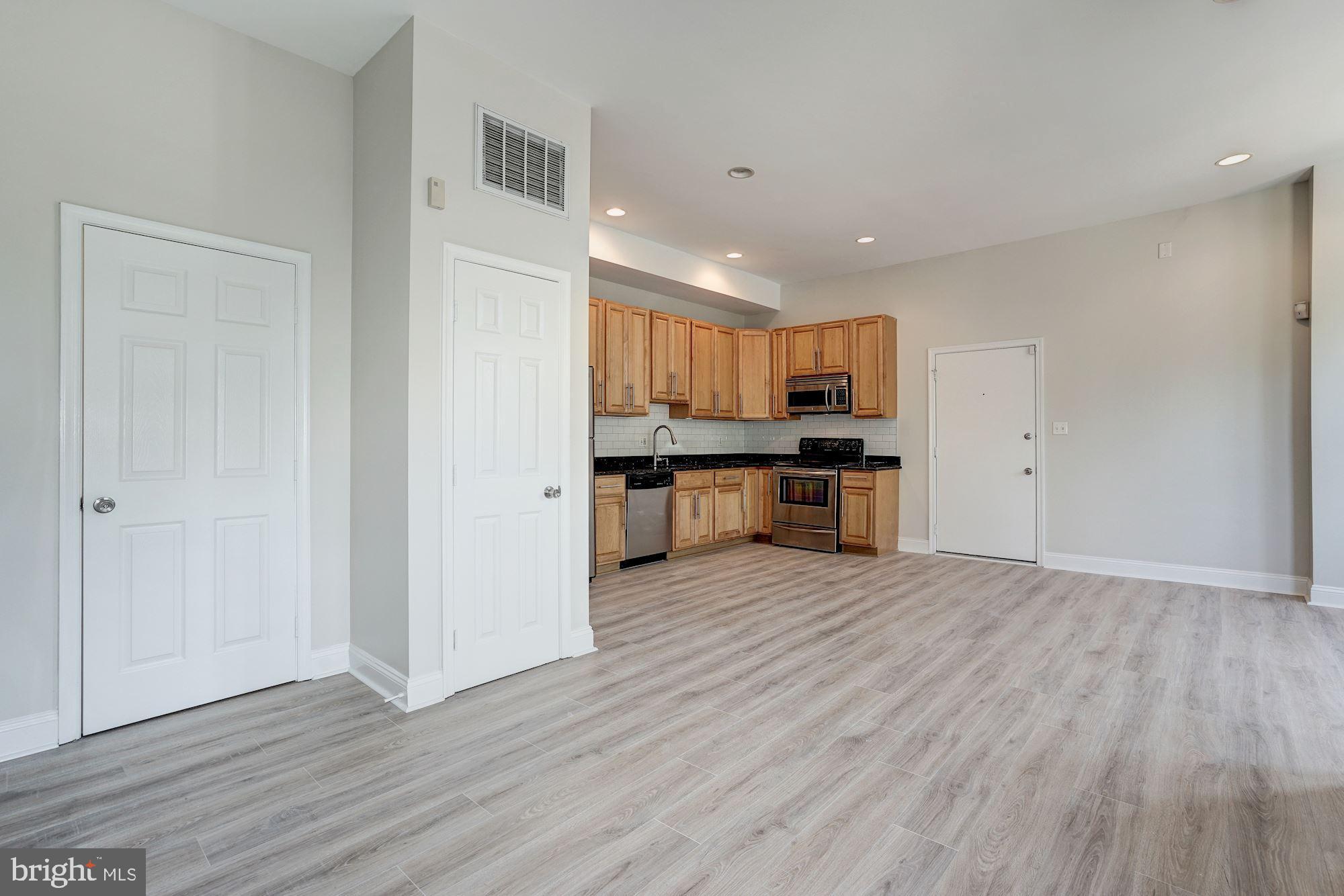 1124 E Street Northeast, Unit C Washington, DC 20002 - Photo 15 of 29 Half bath off off the main living area