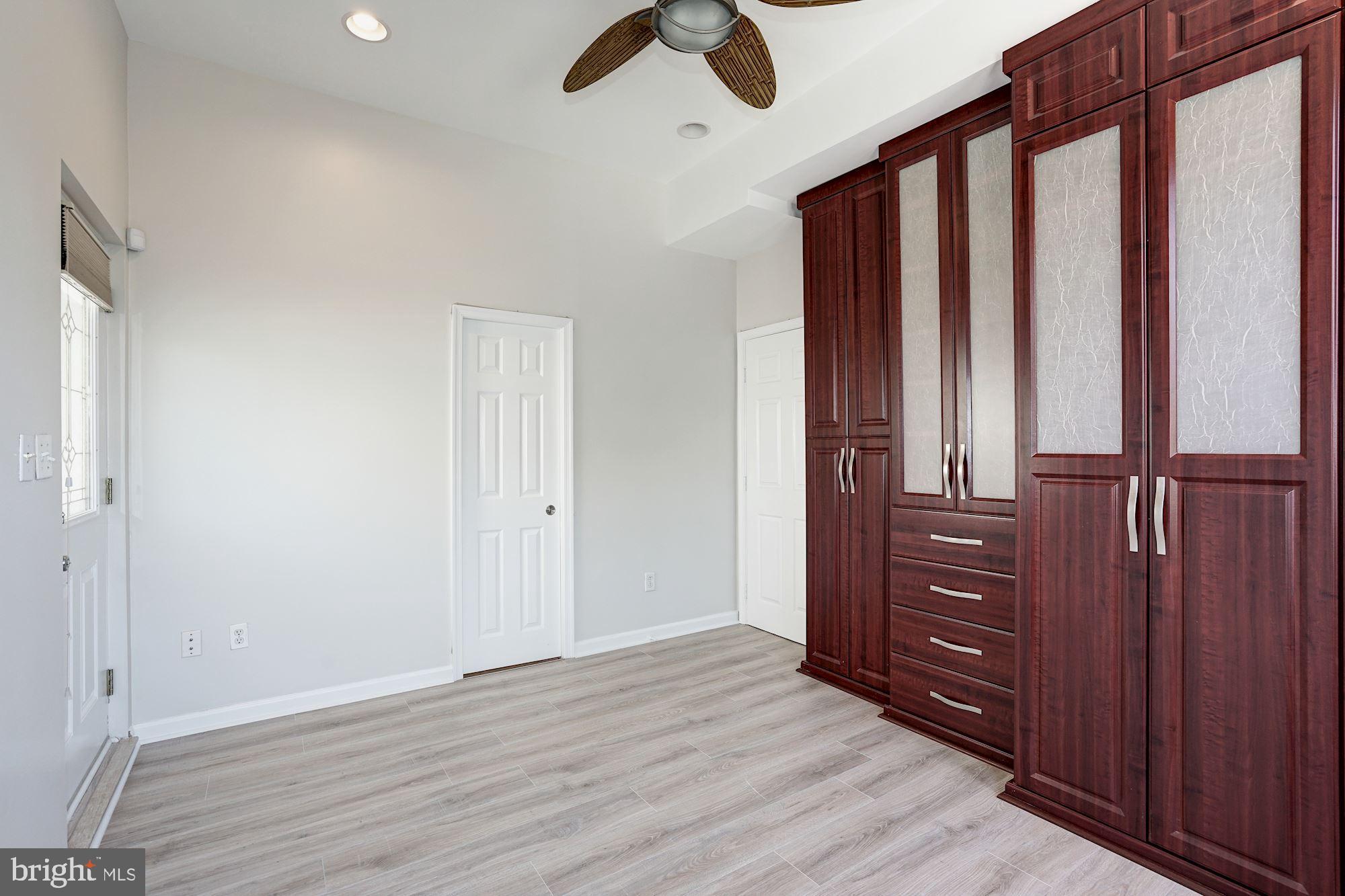 1124 E Street Northeast, Unit C Washington, DC 20002 - Photo 21 of 29 Custom closets line the master bedroom