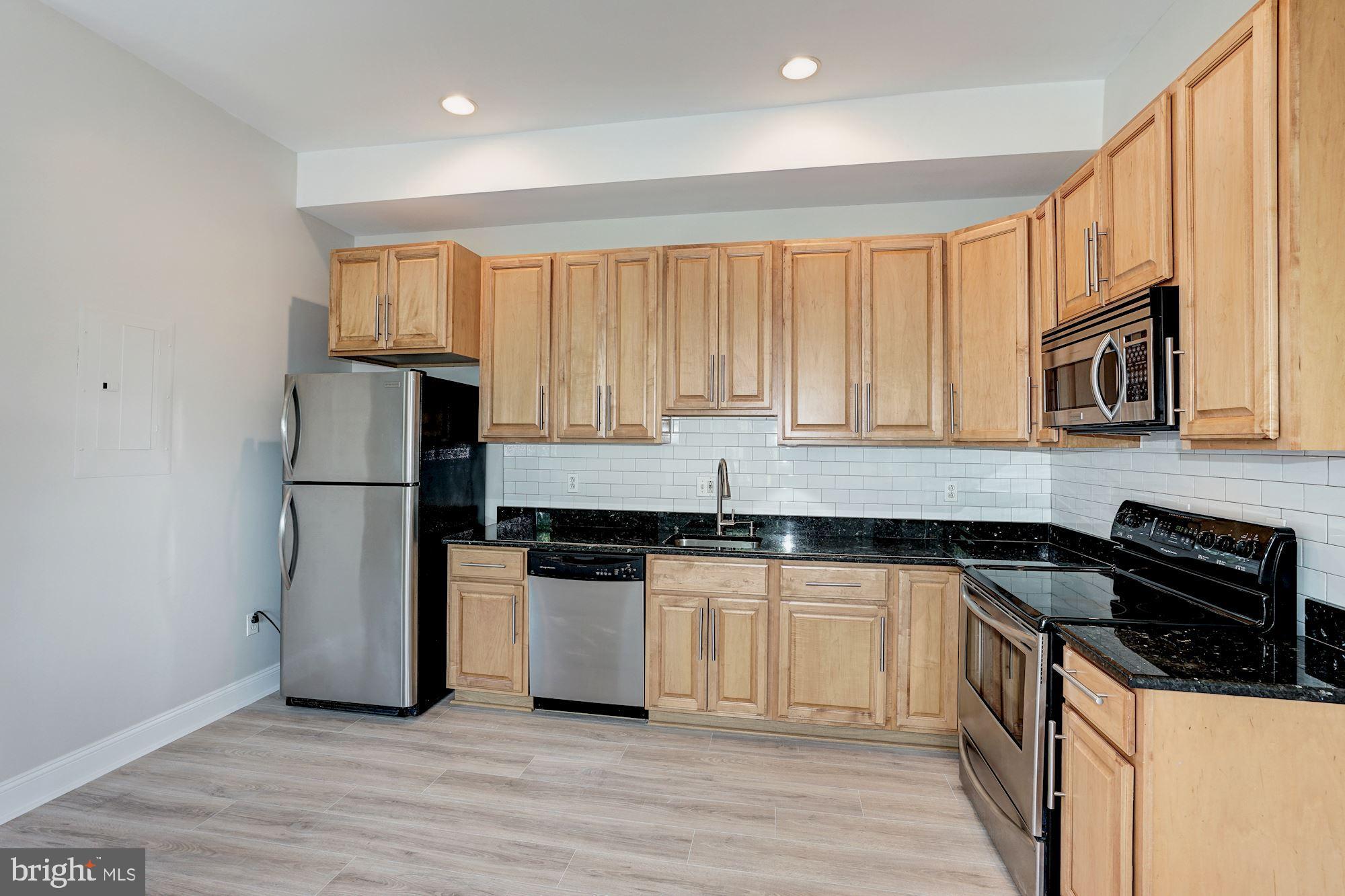 1124 E Street Northeast, Unit C Washington, DC 20002 - Photo 8 of 29 Granite counters, stainless steel appliances