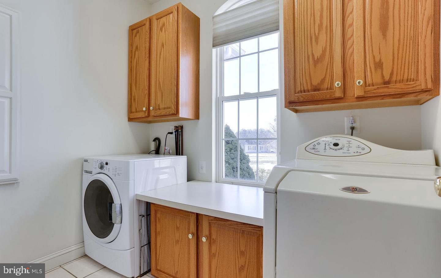 4744 Maple Grove Road Hampstead, MD 21074 - Photo 28 of 61 Main Level Laundry With Folding Table