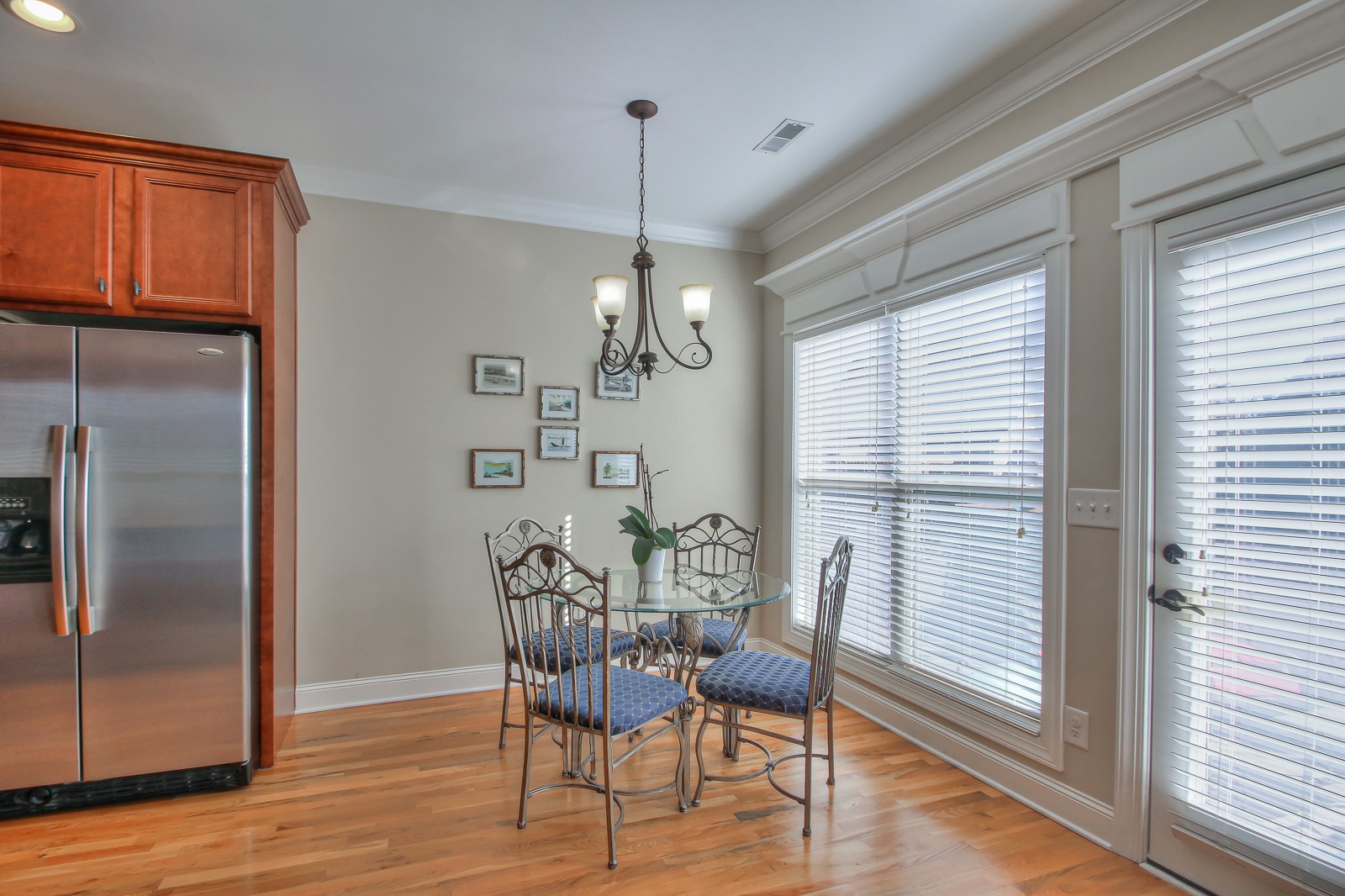 3028 Sakari Circle Spring Hill, TN 37174 - Photo 20 of 46 a view of a dining room with furniture window and wooden floor