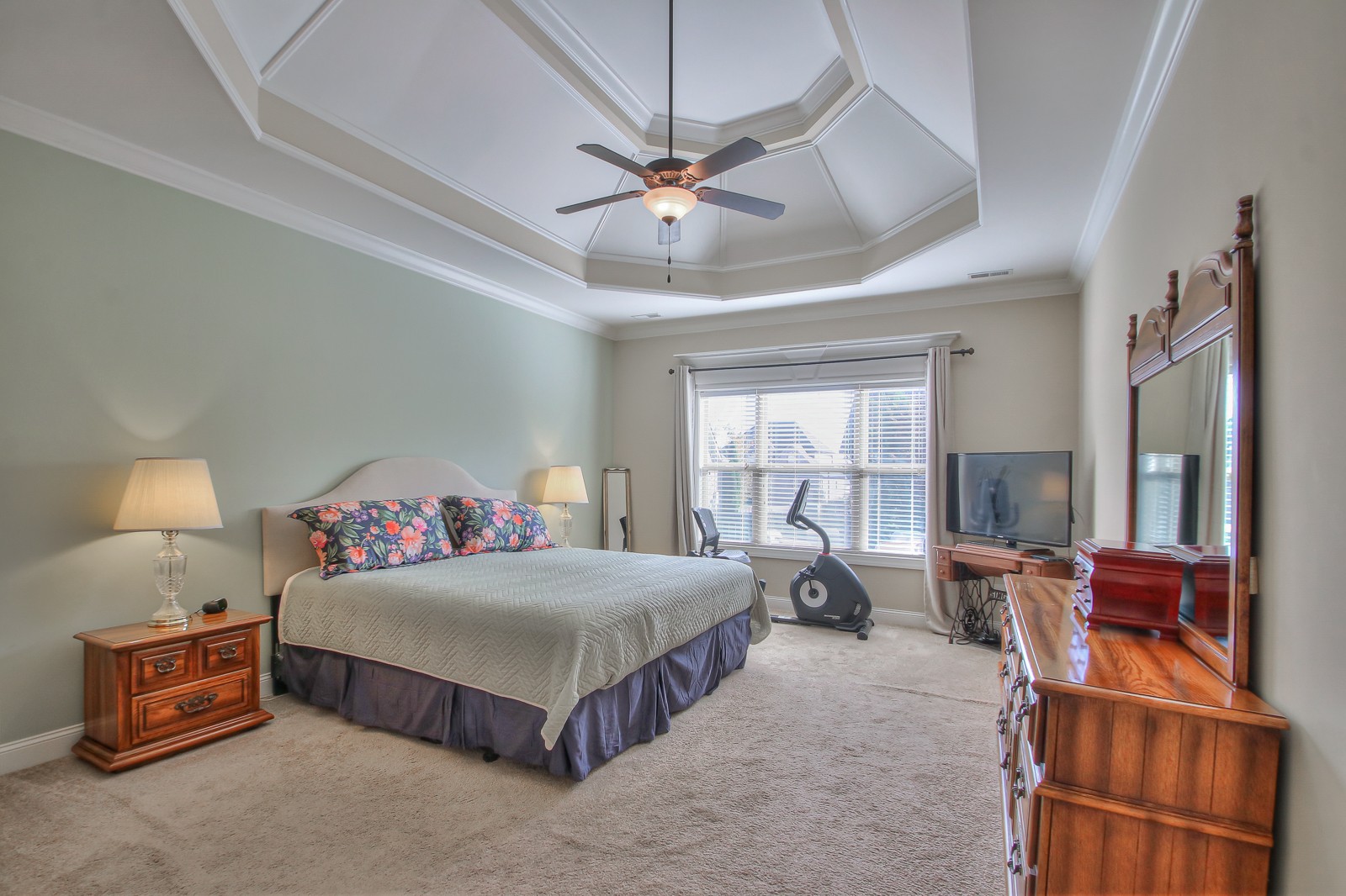 3028 Sakari Circle Spring Hill, TN 37174 - Photo 22 of 46 a bedroom with a bed and wooden floor